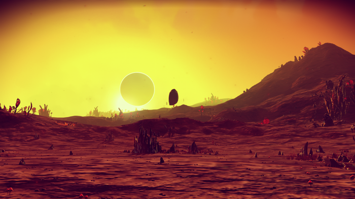 No Man's Sky alien planet landscape with large sun