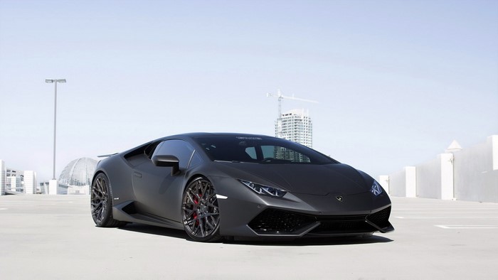 Matte black Lamborghini Huracan in urban setting