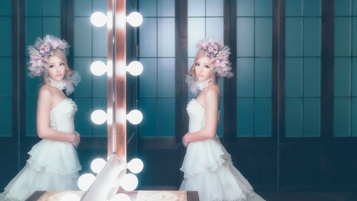 Elegant Bride in White Wedding Dress by Mirror