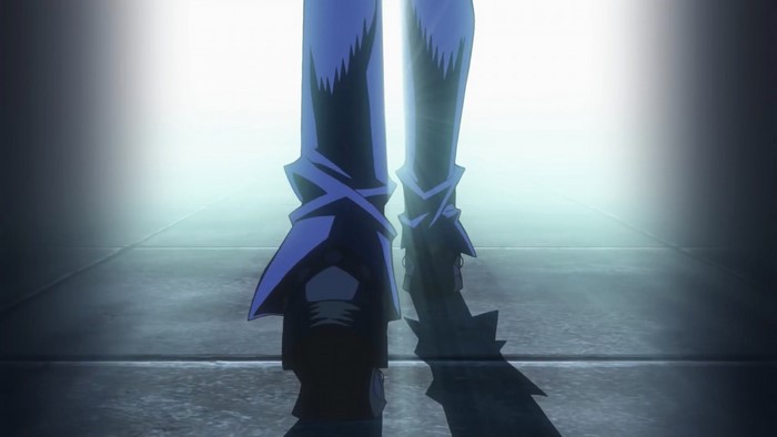 Yugi Moto from Yu-Gi-Oh! standing in light and shadow