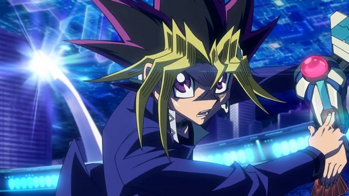 Yugi Muto from Yu-Gi-Oh! holding a Duel Disk