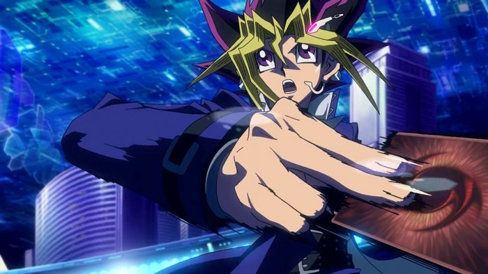 Yugi Muto from Yu-Gi-Oh! holding a card