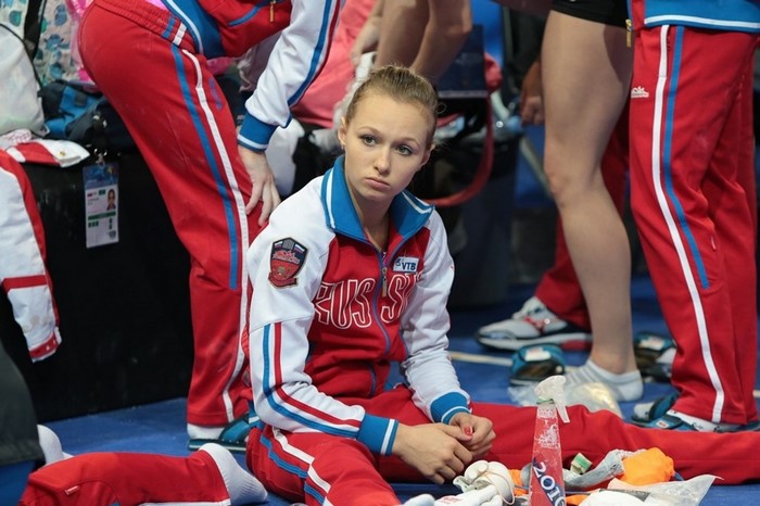 Daria Spiridonova Russian gymnast sitting on floor