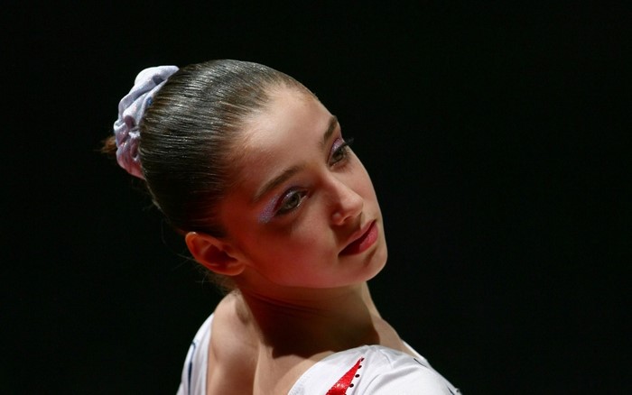 Gymnast Aliya Mustafina with her hair tied back