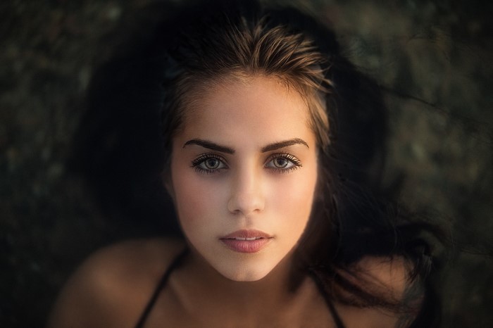 Woman with wet hair looking up