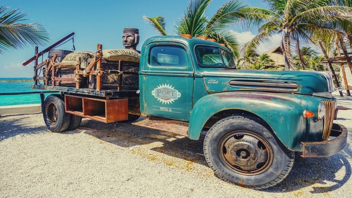 Vintage Ford truck with cargo by the ocean
