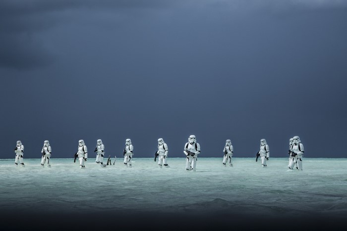 Stormtroopers from Rogue One: A Star Wars Story walking in shallow water
