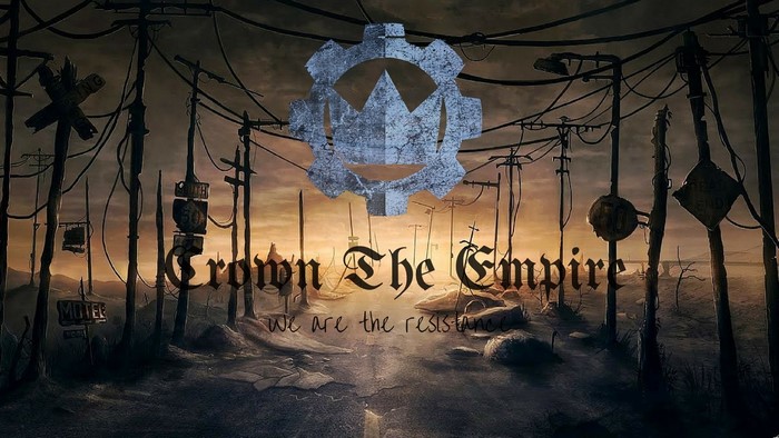 Crown The Empire logo and slogan with post-apocalyptic background