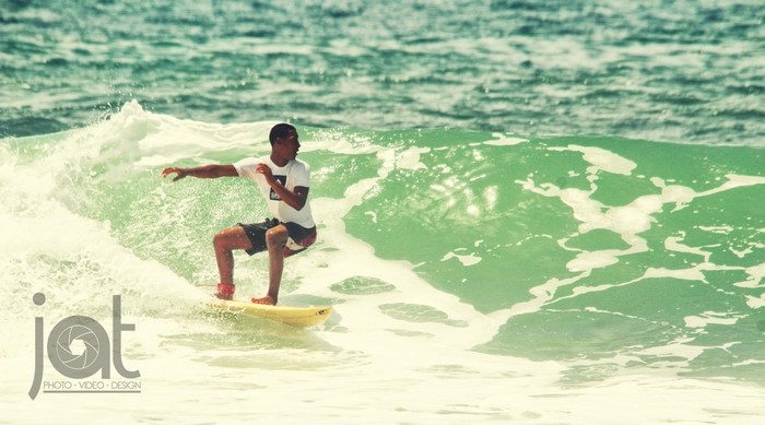 Surfer riding a wave in Bocas del Toro, Panama