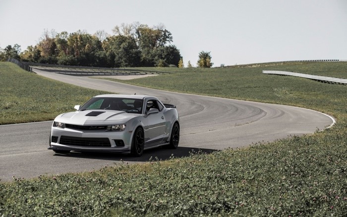 Silver Chevrolet Camaro Z28 on a race track