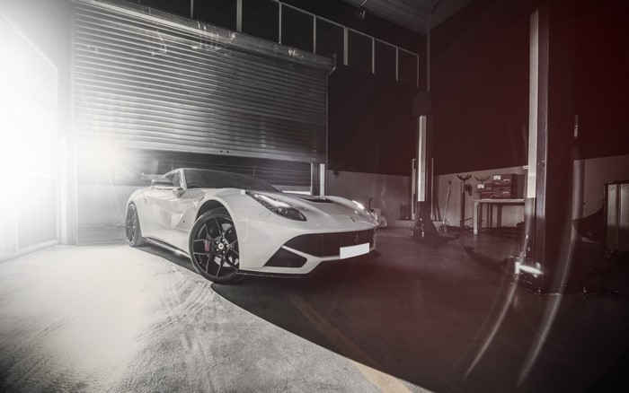 White Ferrari F12berlinetta in a garage