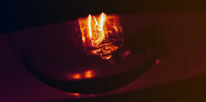 Close-up of a glowing light bulb filament