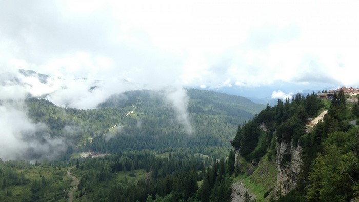 Mountain landscape with clouds and forest