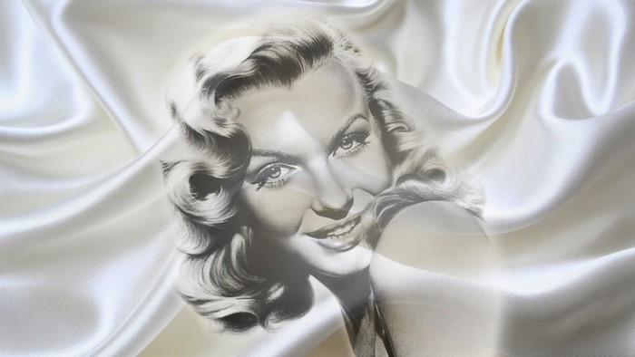 Marilyn Monroe portrait on white satin fabric