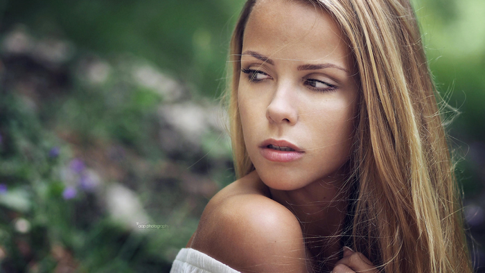 Portrait of a young woman with blonde hair