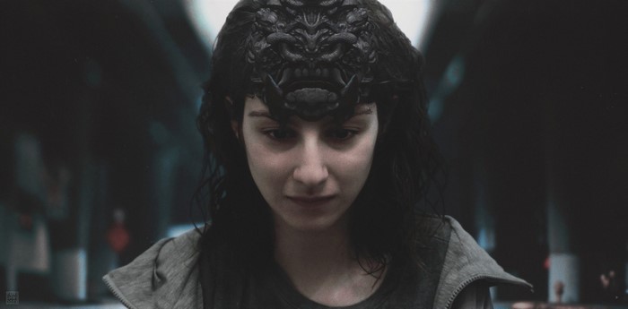 Woman with a dark mask on her head