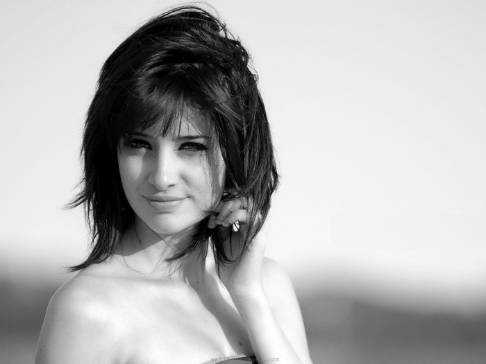 Black and White Portrait of a Smiling Woman