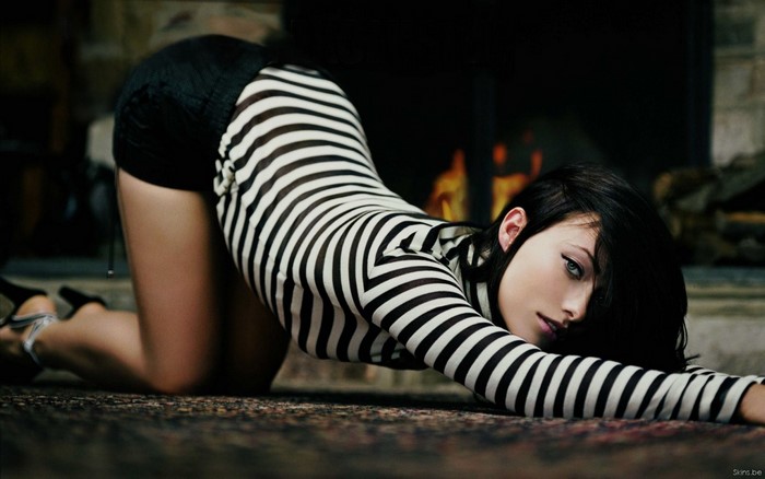 Olivia Wilde in Striped Top and Shorts Pose