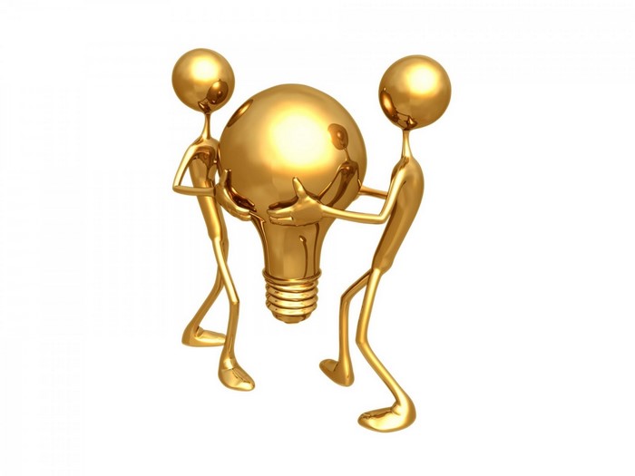 Two golden figures holding a large light bulb