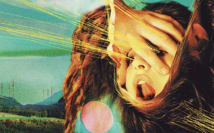 The Flaming Lips album cover with a distressed face