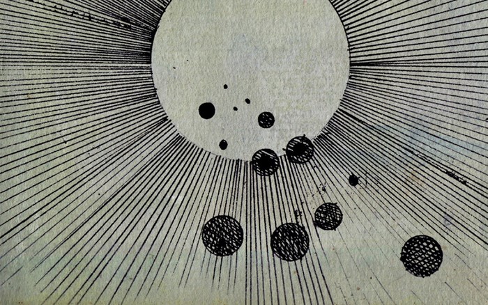 Abstract drawing of a sun with orbiting planets
