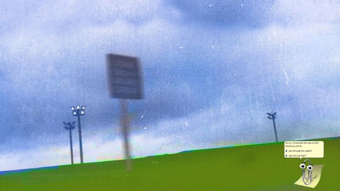 Clippy on a field with stadium lights