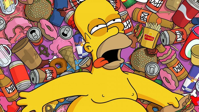 Homer Simpson surrounded by food and drinks