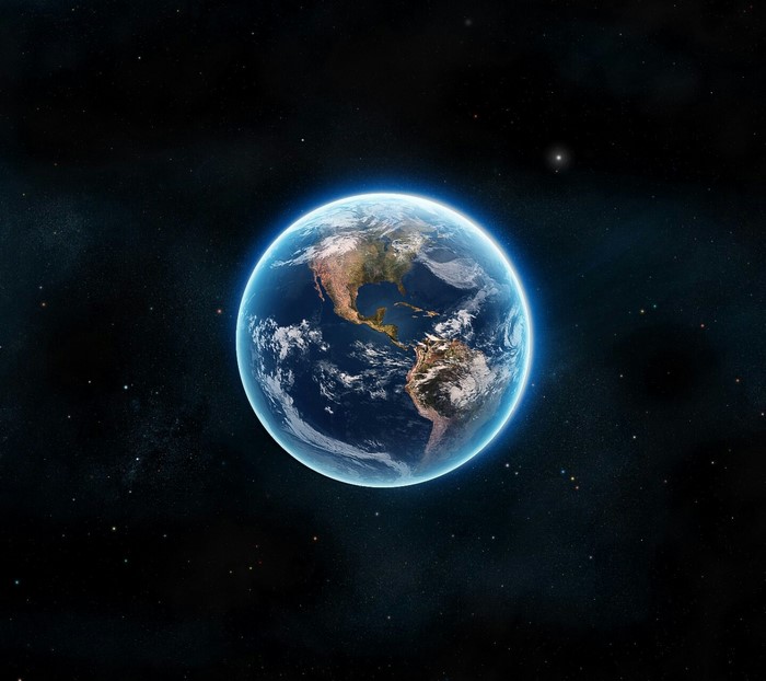 Earth in outer space with stars