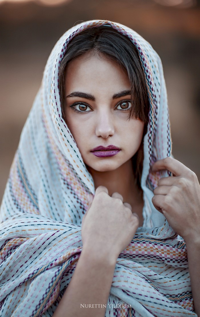 Portrait of a woman wearing a headscarf