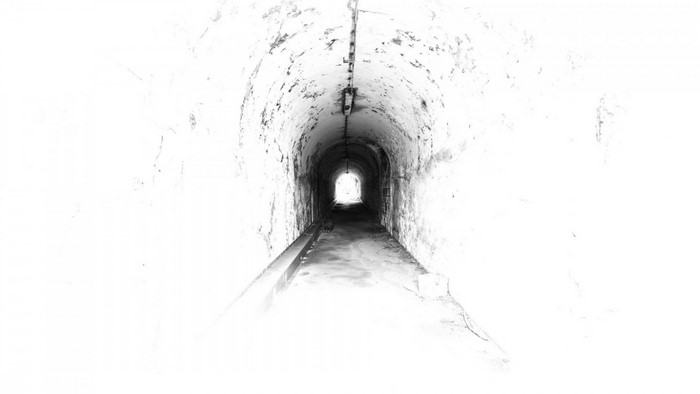 Monochrome illustration of a dark tunnel with light at the end