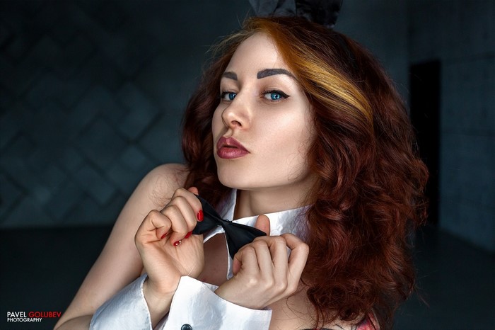 Close-up Portrait of Redhead Woman with Curly Hair