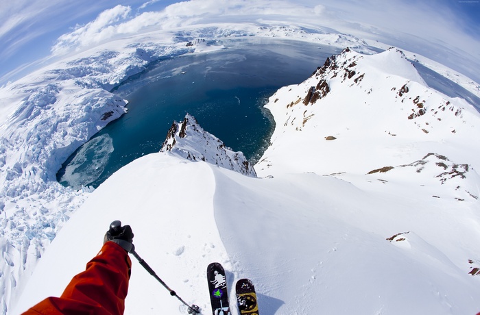 Skiing down a snowy mountain in Antarctica
