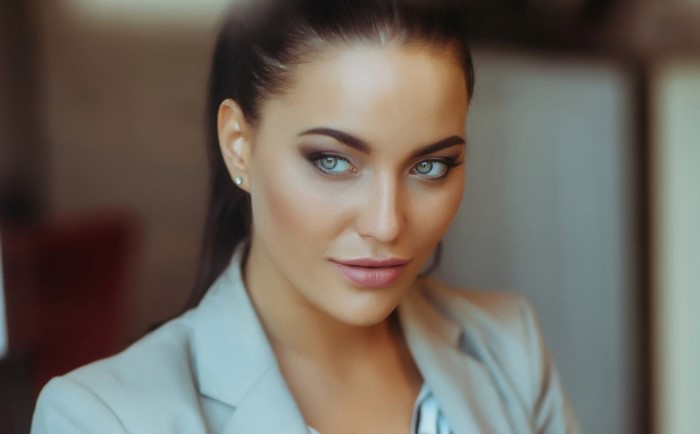 Portrait of a Woman with Striking Blue Eyes
