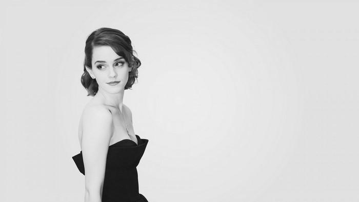 Emma Watson in a black dress, monochrome portrait
