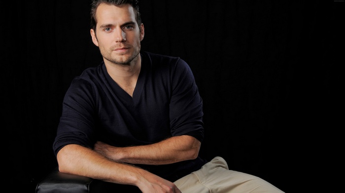 Henry Cavill posing for a photo