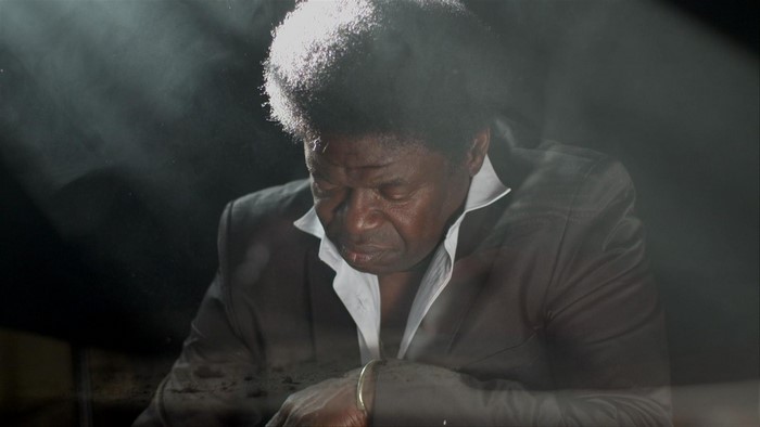 Charles Bradley with afro and suit