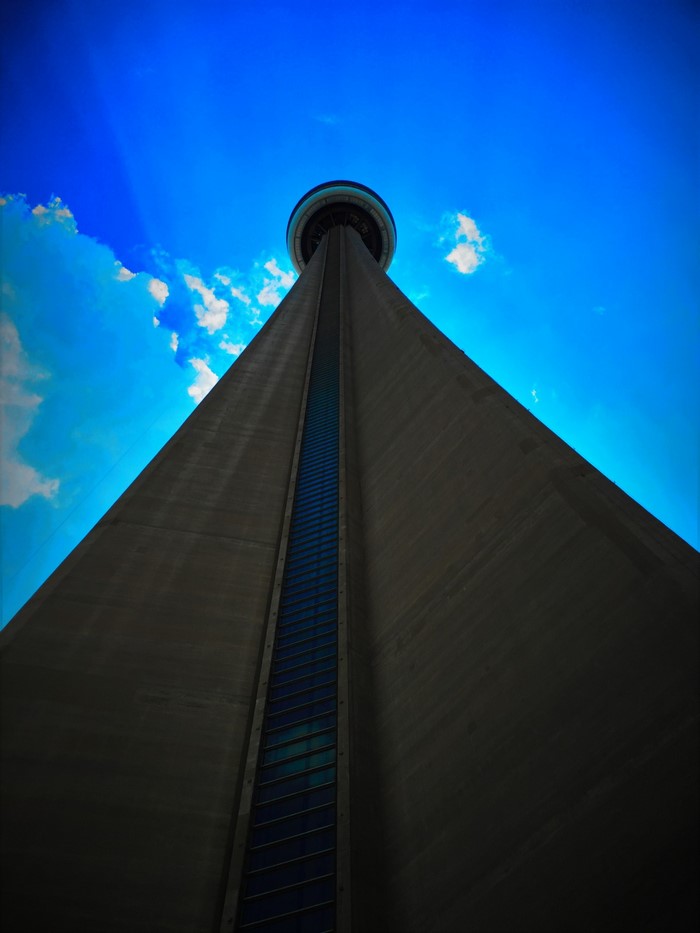 CN Tower against a bright blue sky
