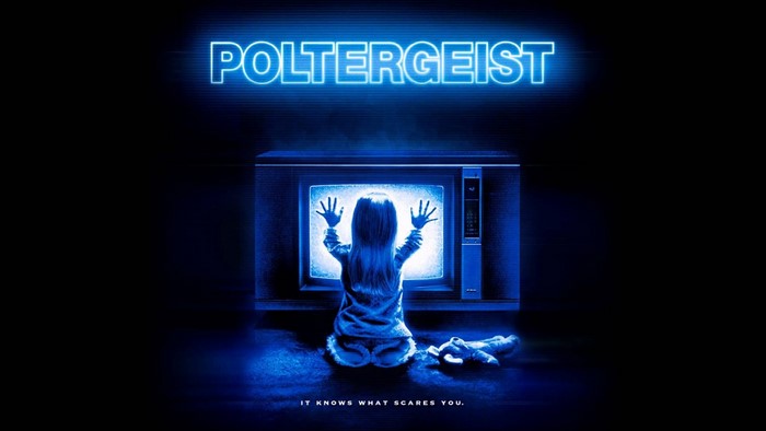 Poltergeist movie poster with girl at TV