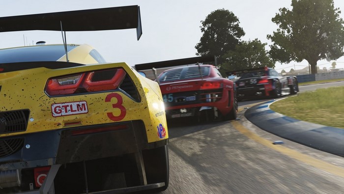 Corvette GTLM and Audi R8 LMS race cars on track