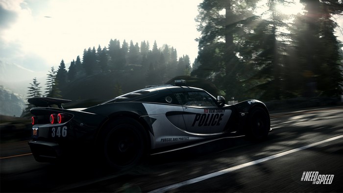 Police sports car from Need for Speed driving on a forest road