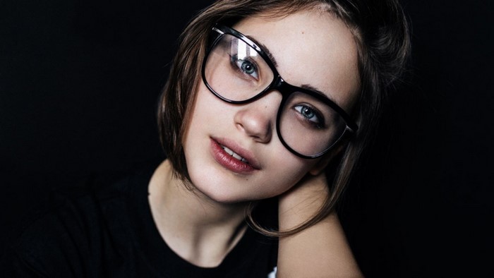 Close-Up Portrait of Woman with Glasses