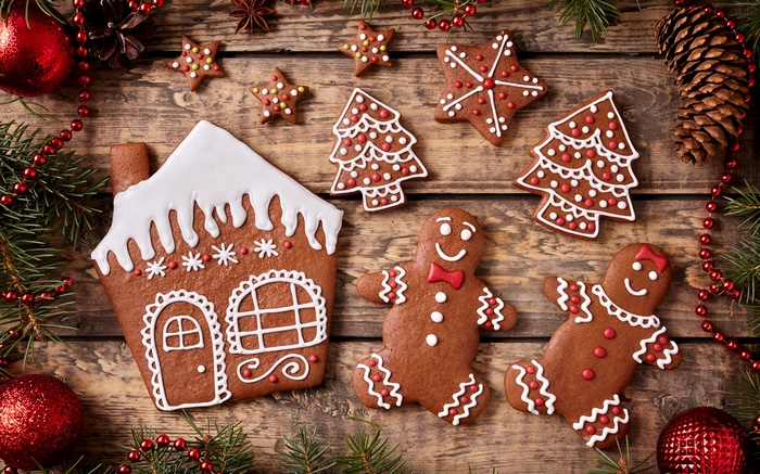 Christmas gingerbread cookies on wooden background