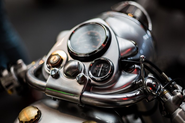 Close-up of a vintage motorcycle's dashboard