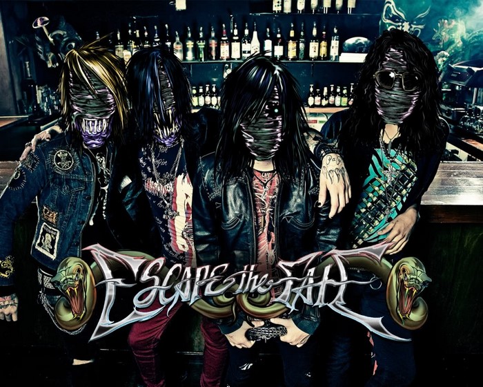 Escape The Fate band members in a bar