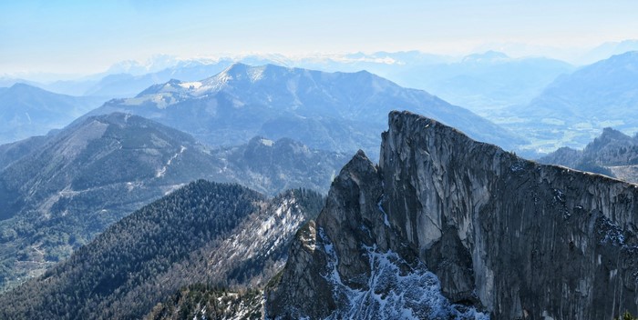 Jagged mountain ridge with snow-dusted peaks and valleys