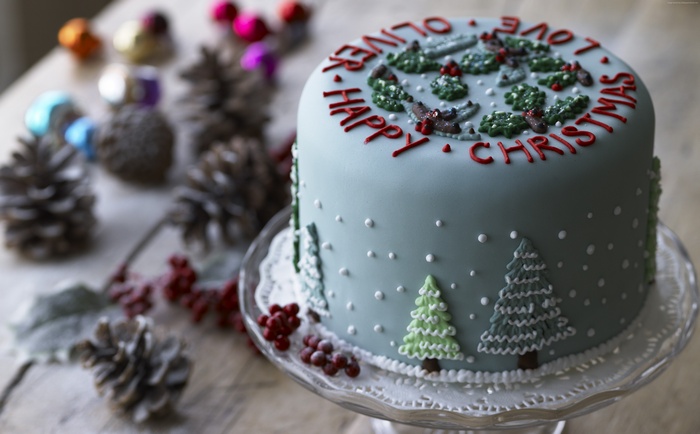 Christmas cake with 'Happy Christmas Oliver' inscription
