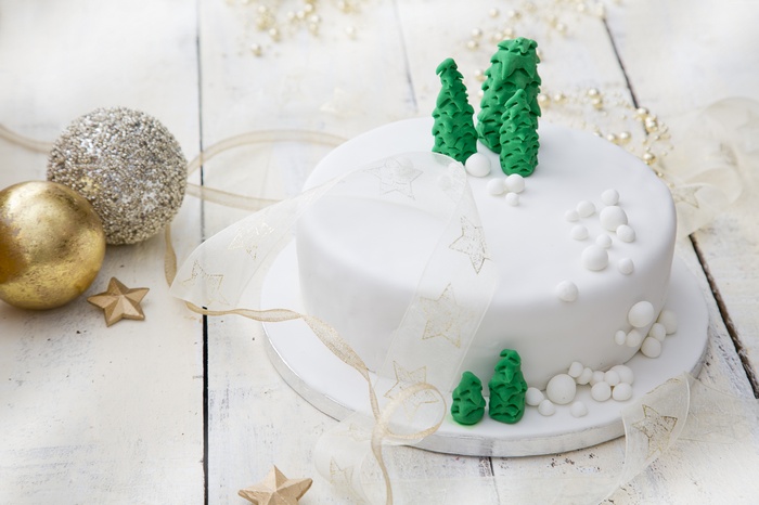 Christmas cake with fondant trees and ornaments