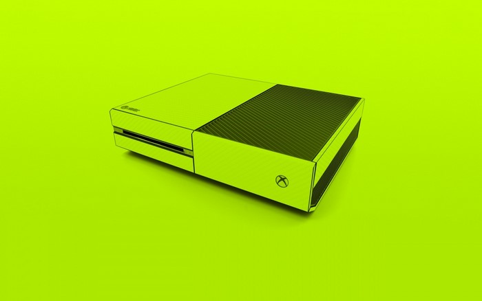 Xbox One console on a neon green background