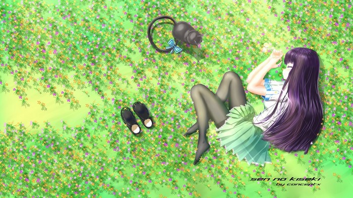Girl lying in a field of flowers