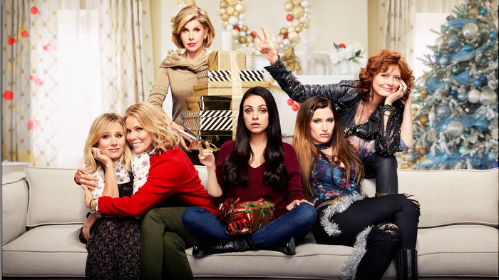 A Bad Moms Christmas cast on couch